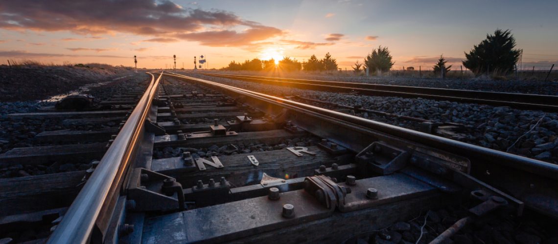 Sunset,Over,Railway,Tracks,,Low,Perspective,With,Detail,View,Of